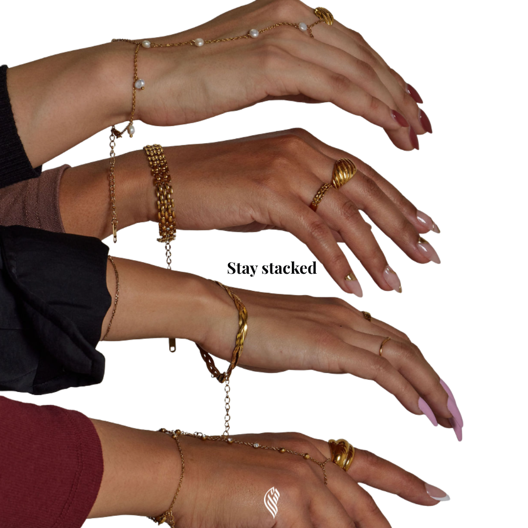 Three hands wearing gold bracelets and rings with 'Stay stacked' text.