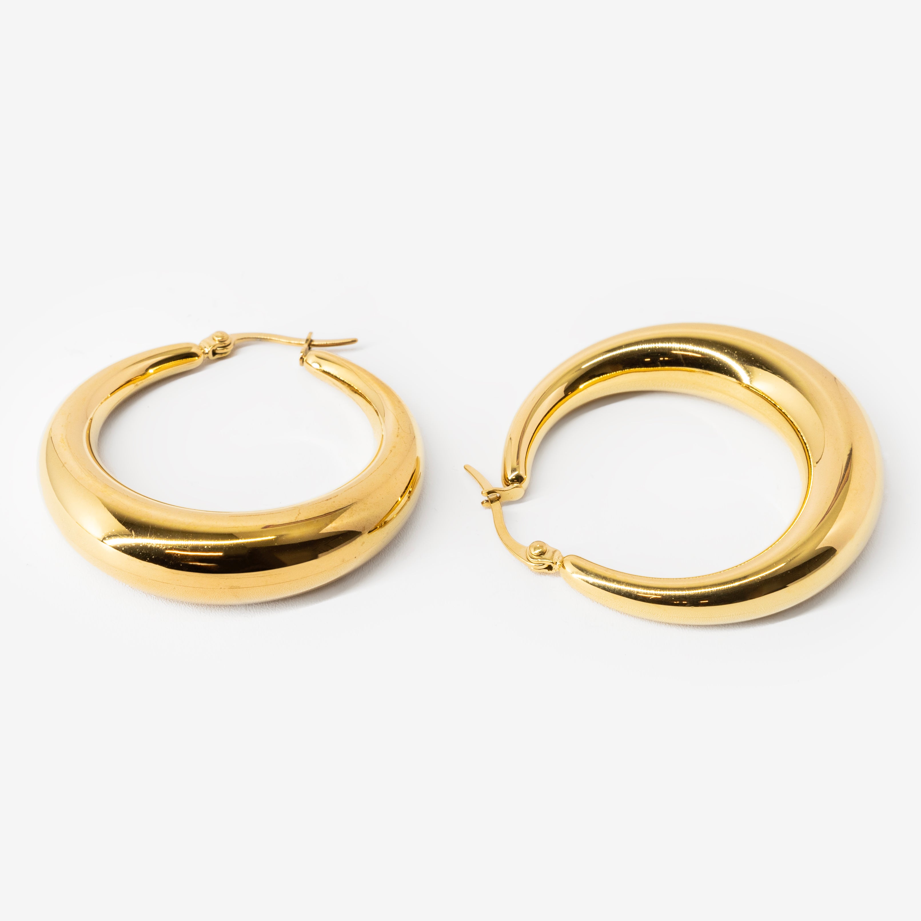 18k gold plated stainless steel crescent hoop earrings by Salaam Gallery, elegant and affordable jewelry