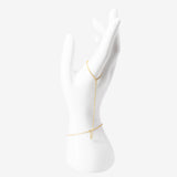 18k gold plated stainless steel essential hand chain bracelet by Salaam Gallery, elegant and affordable jewelry