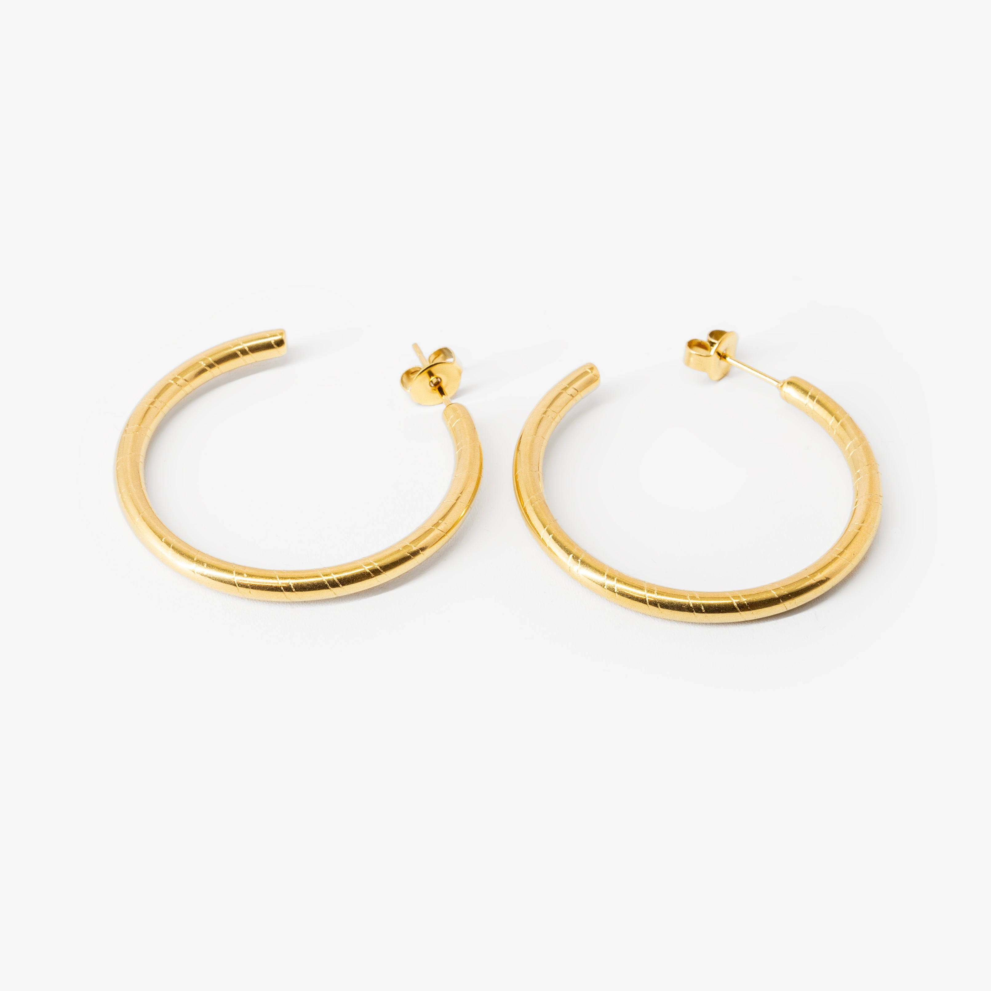 18k gold plated stainless steel essential hoop earrings earrings by Salaam Gallery, elegant and affordable jewelry	