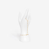 18k gold plated stainless steel luxe bezel hand chain bracelet by Salaam Gallery, elegant and affordable jewelry