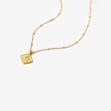 So Verily, With Hardship Comes Ease” Mini Diamond Calligraphy Necklace – 18K Gold Plated