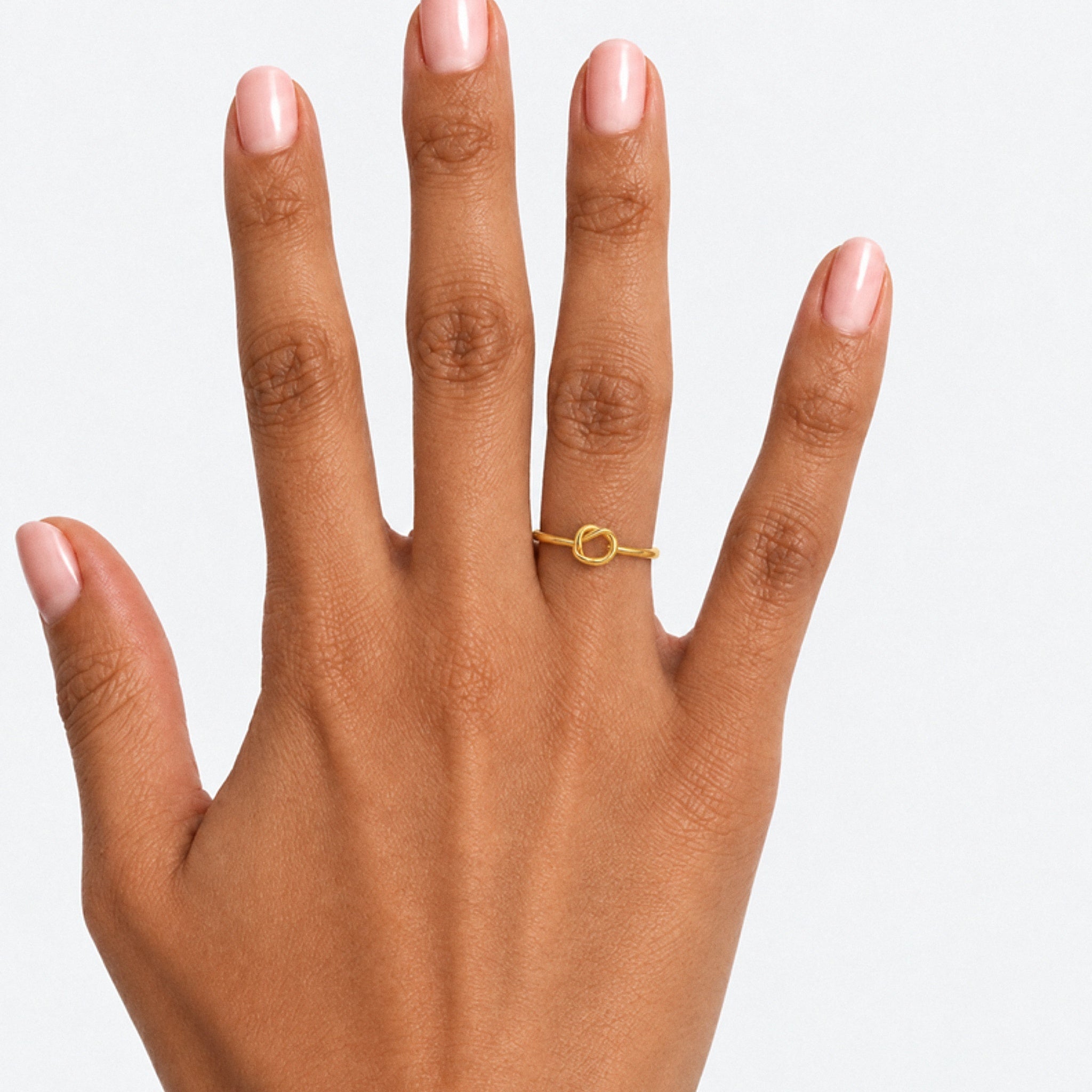 Ahd Love Knot Ring – 18K gold plated stainless steel, styled lifestyle shot