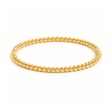 Aurora gold bead bangle in 18K gold plated stainless steel on white background