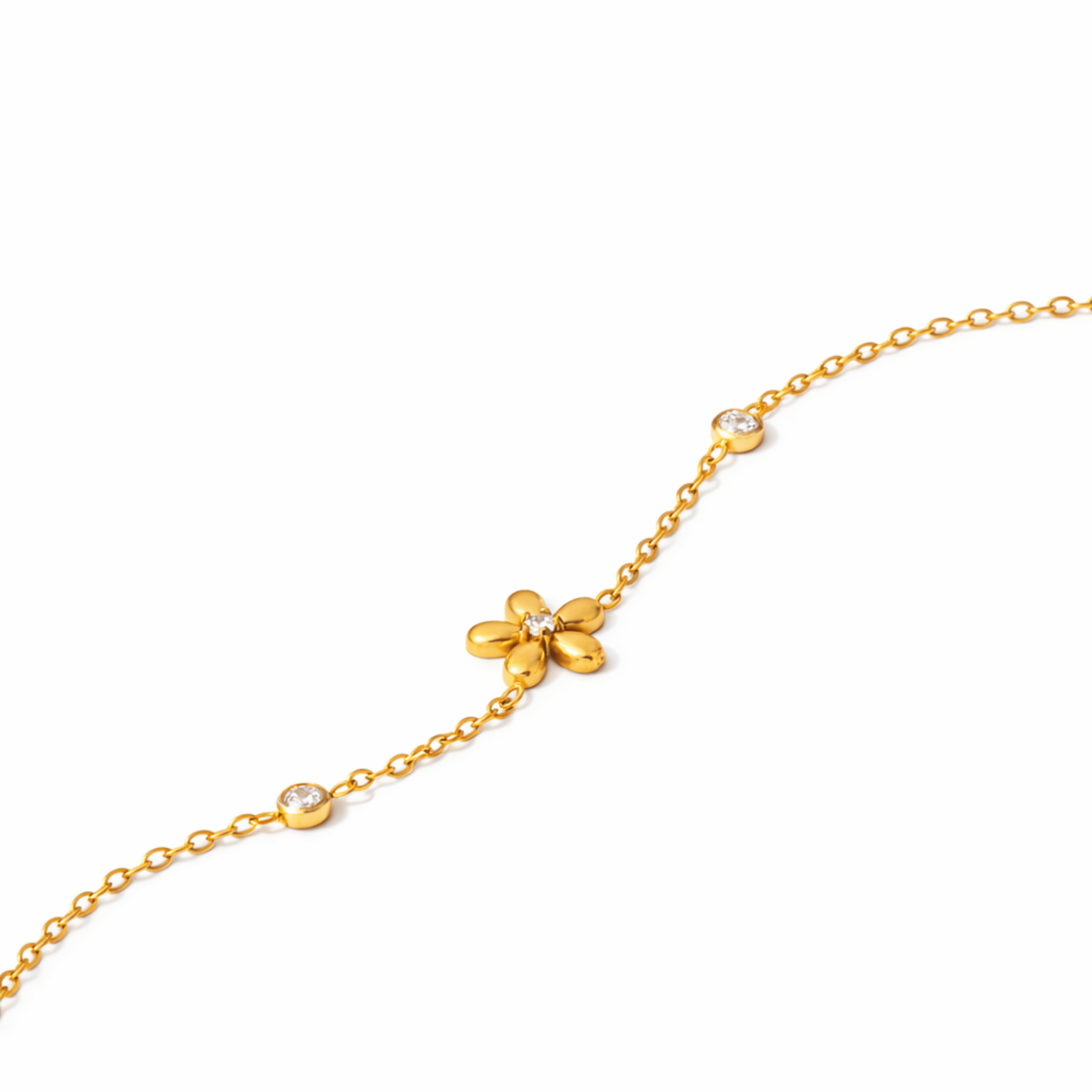Close up of Bloom gold flower bracelet with crystal accents and delicate chain