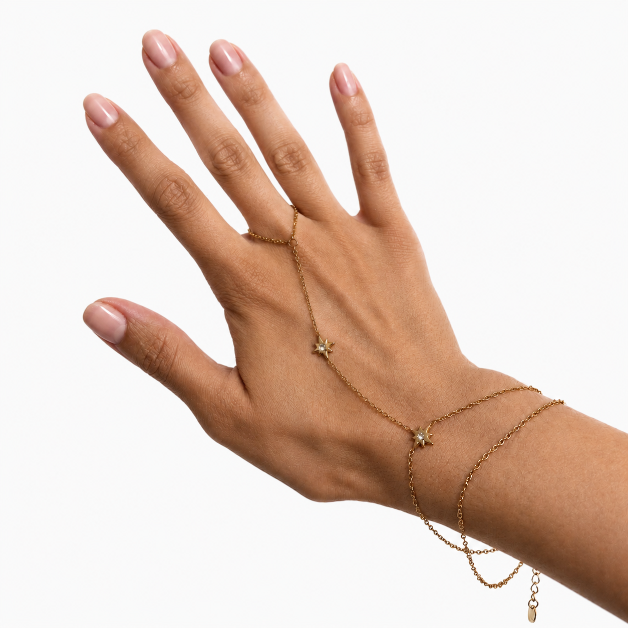 Celestial Star Gold Hand Chain worn on hand with bracelet-ring chain design and star charm details