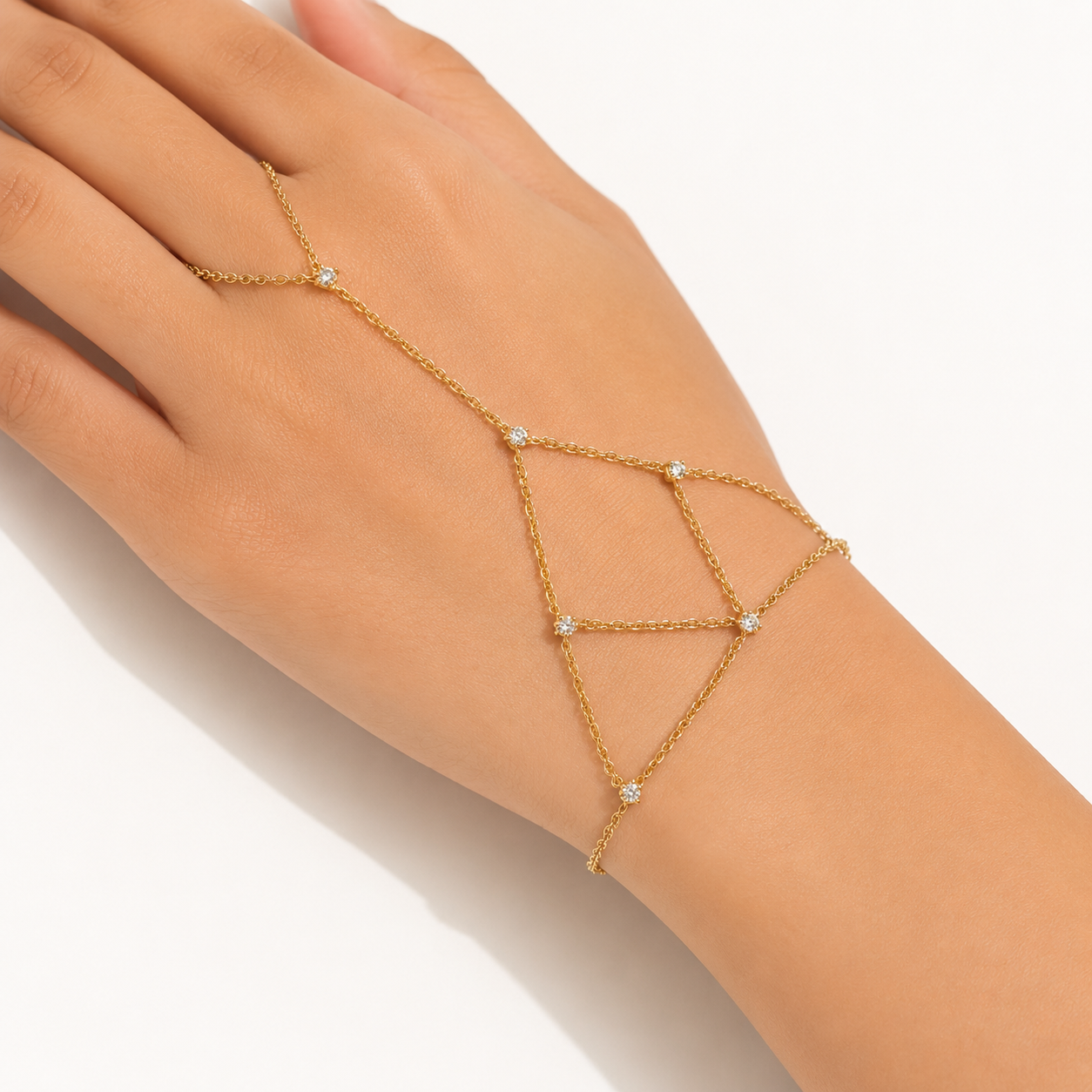 Crystal Lattice Gold Hand Chain worn on hand with a delicate lattice bracelet-ring silhouette