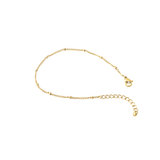 Dainty Dotted Bracelet in 18K gold plated stainless steel with spaced bead detailing and adjustable chain on white background