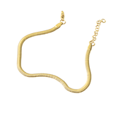 Dainty Herringbone Bracelet in 18K gold plated stainless steel featuring flat polished chain and adjustable extension