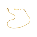 Dainty Snake Bracelet in 18K gold plated stainless steel featuring smooth rounded snake chain and adjustable extension