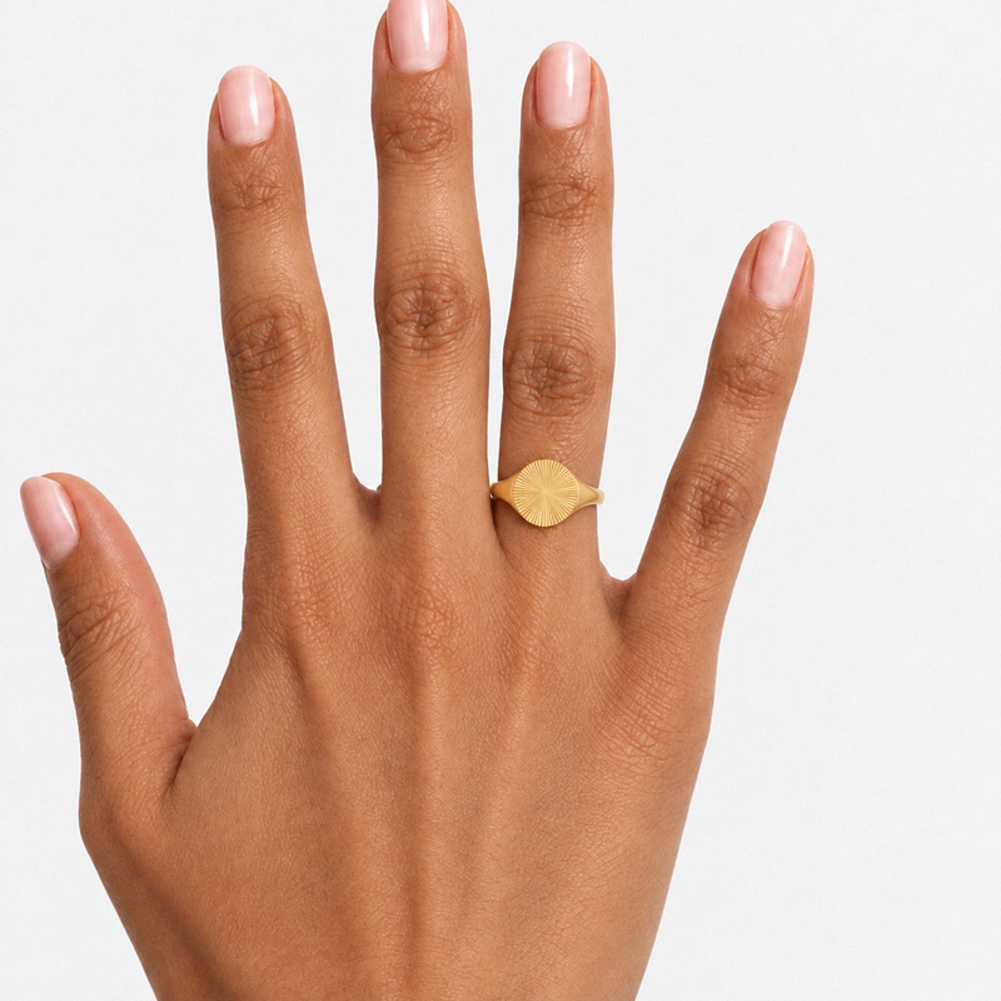 Dhuha Signet Ring – 18K gold plated stainless steel, styled lifestyle shot