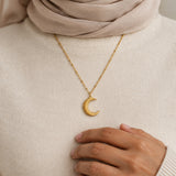 Hilal Crescent Necklace – 18K gold plated stainless steel, styled lifestyle shot
