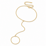 Minimal Classic Gold Hand Chain with a delicate bracelet-to-ring chain design on a white background
