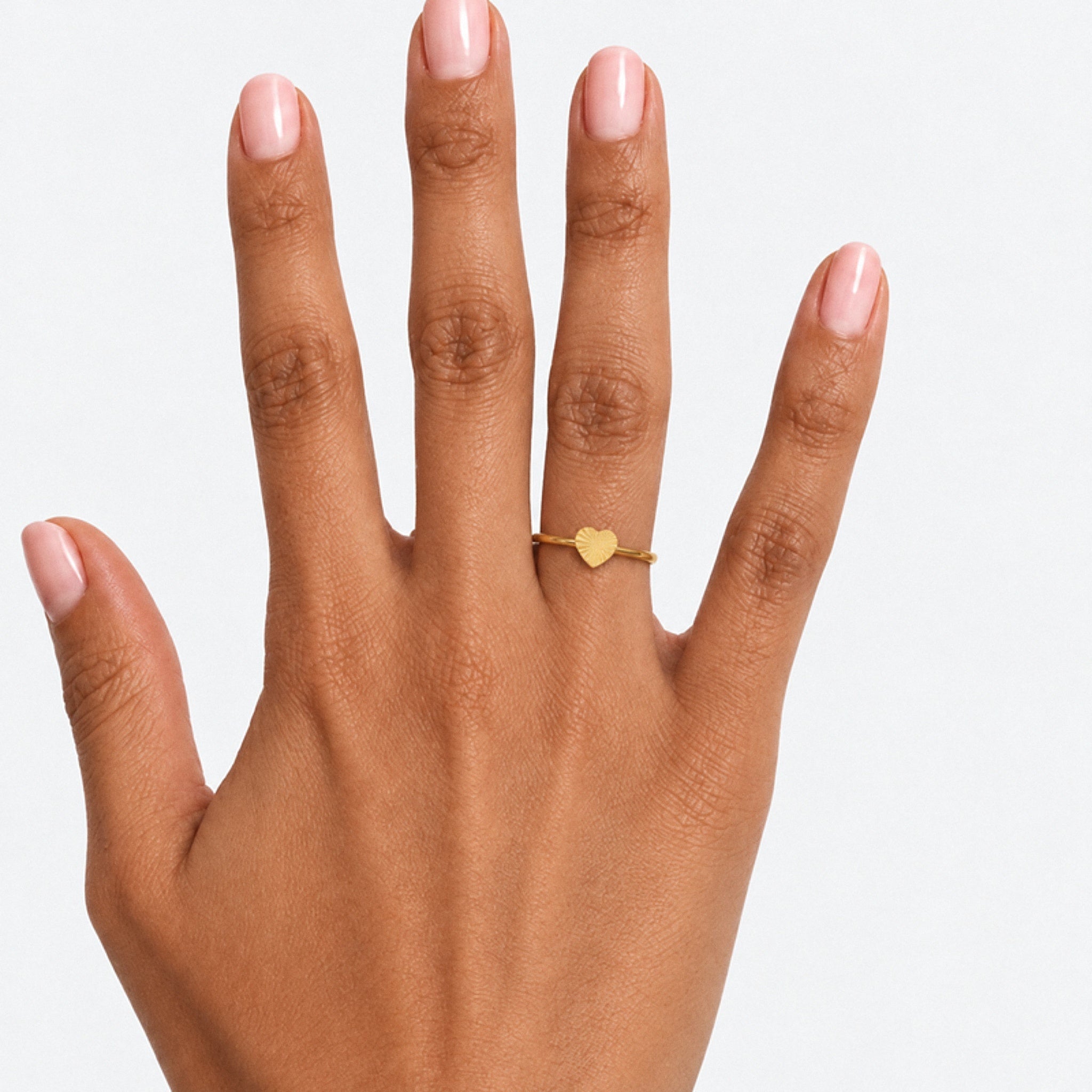 Qalb Heart Ring – 18K gold plated stainless steel, styled lifestyle shot