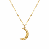 Qamar Crescent Pendant gold crescent moon necklace on white background