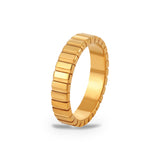 Riwaq Fluted Band Ring – 18K gold plated stainless steel, on a white background