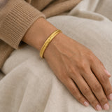 Sunbula Wheat Bangle – 18K gold plated stainless steel, styled lifestyle shot