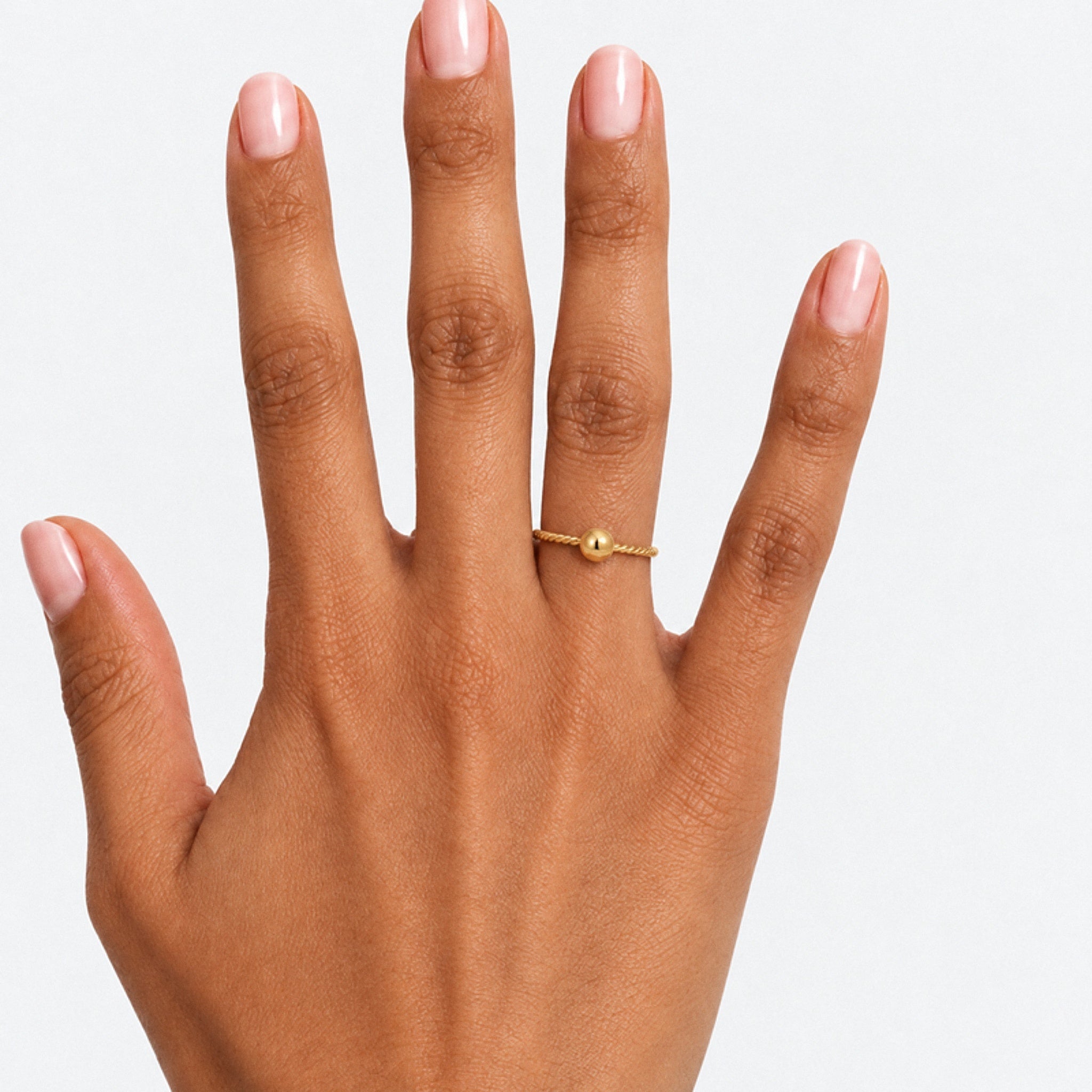 Tasbih Bead Ring – 18K gold plated stainless steel, styled lifestyle shot
