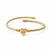 Tawakkul Love Bangle in 18K gold plated stainless steel with heart charm engraved توكل on white background